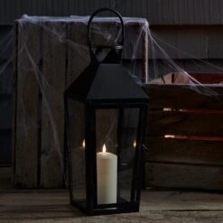 Mittelgroße Cairns Metall Laterne In Schwarz Mit TruGlow® Outdoor Kerze 12 Mittelgroße Cairns Metall Laterne In Schwarz Mit TruGlow® Outdoor Kerze -Geschäft Für Dekorative Beleuchtung LA20021 Cairns Halloween Laterne