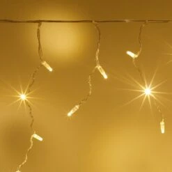 Core Connect 2m 64er LED Eiszapfen Lichterkette Warmweiß Koppelbar Transparentes Kabel 10 Core Connect 2m 64er LED Eiszapfen Lichterkette Warmweiß Koppelbar Transparentes Kabel -Geschäft Für Dekorative Beleuchtung ML64YWC Warm White LED Icicle Light christmas close up P4